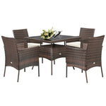 5 Piece Outdoor Rattan Dining Table Set with Tempered Glass Tabletop and 4 Cushioned Chairs