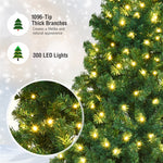 7FT Pre-lit Artificial Christmas Tree Green Hinged Xmas Tree with 300 Warm White LED Lights, 1096 Branch Tips & Metal Foldable Stand for Holiday Decor